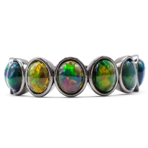 1.49 Carat Black Ethiopian Opal Seven-Stone Bezel Ring 14K Gold