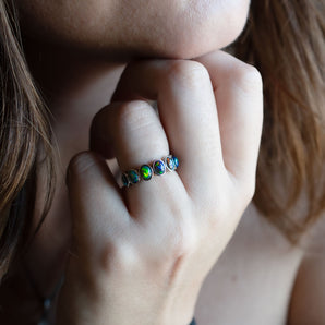 1.49 Carat Black Ethiopian Opal Seven-Stone Bezel Ring 14K Gold