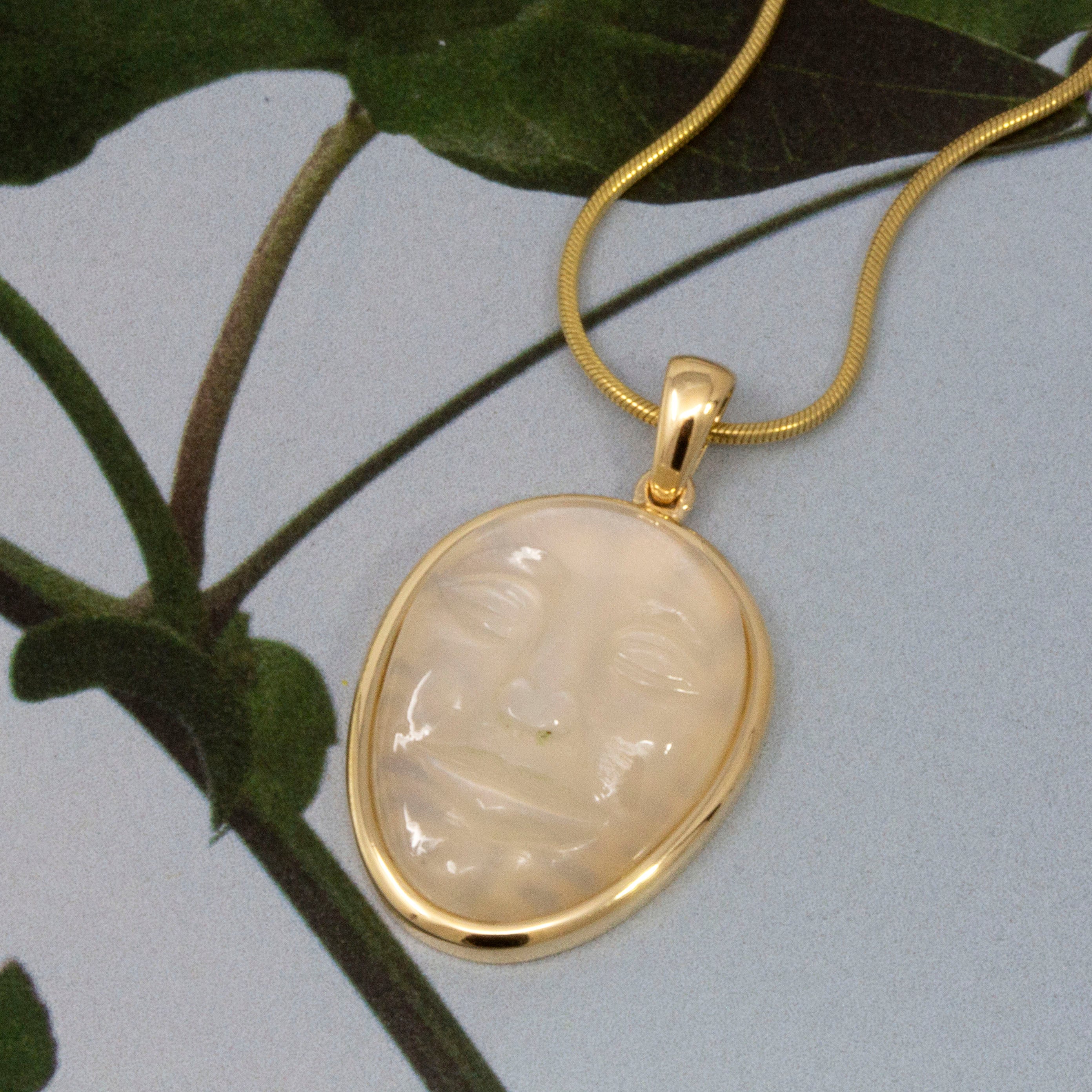 Glowing Face Of The Moon: Carved Moonstone Pendant